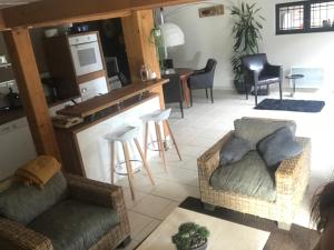 Posezení v ubytování Appartement Sevrier terrasse et jardin