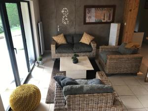 Posezení v ubytování Appartement Sevrier terrasse et jardin