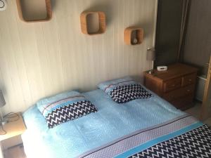 Postel nebo postele na pokoji v ubytování Appartement Sevrier terrasse et jardin