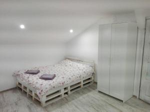 Postel nebo postele na pokoji v ubytování INFINITY Blue 1