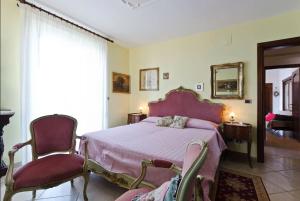 Posteľ alebo postele v izbe v ubytovaní Miriam Sea Front Apartment Jacuzzi