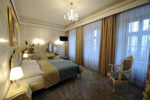 Postel nebo postele na pokoji v ubytování Hotel Prince de Ligne + 37 fotografií