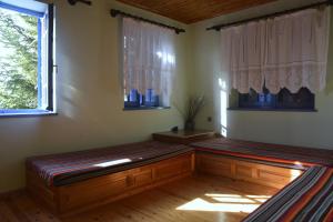 Postel nebo postele na pokoji v ubytování Petroto house