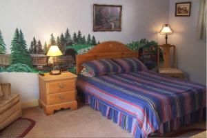 Кровать или кровати в номере Wells River Motel