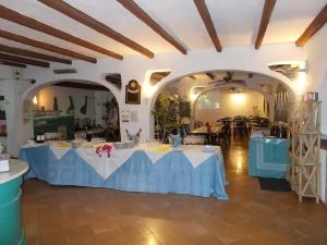 Restavracija oz. druge možnosti za prehrano v nastanitvi Hotel Conti