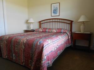 Postel nebo postele na pokoji v ubytování Shaw's Hotel & Cottages
