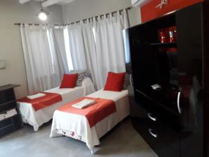 Ένα ή περισσότερα κρεβάτια σε δωμάτιο στο Cabaña Loft La Ribera