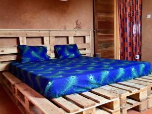 Llit o llits en una habitació de Ker Lep Jamm - Chez Moussa et Cinzia