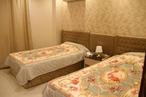 Katil atau katil-katil dalam bilik di Lebanon Apartment