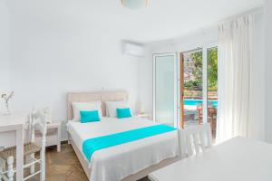 Postel nebo postele na pokoji v ubytování Villa Sofia