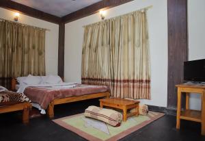 A bed or beds in a room at Hotel Hakoniwa