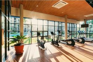 a gym with a bunch of exercise bikes in it at Rain cha-am by J in Cha Am