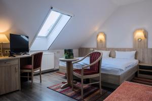 Posteľ alebo postele v izbe v ubytovaní Restaurant & Pension Storchenklause