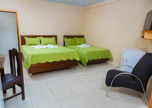Cama o camas de una habitación en Class Apart Hotel