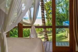 Postel nebo postele na pokoji v ubytování Charm Bahia Residencias + 37 fotografií
