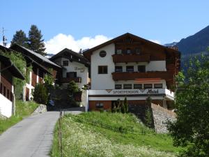 a street in a village in the mountains at Apart Himmel-Raich in Kaunertal