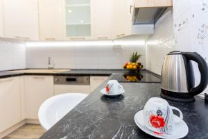 Kuchyň nebo kuchyňský kout v ubytování Urban Luxury Suites Juricevic