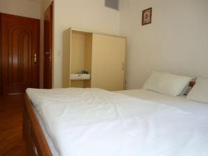 Postel nebo postele na pokoji v ubytování Hotel VilaGora Krushevo