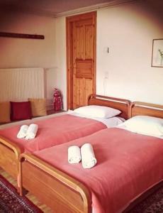 Postel nebo postele na pokoji v ubytování Guesthouse Gouris