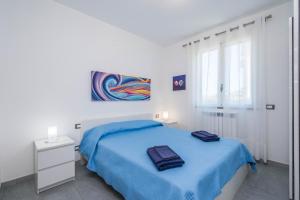 Ένα ή περισσότερα κρεβάτια σε δωμάτιο στο Villa Sara