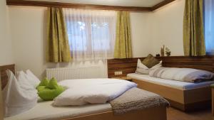 Letto o letti in una camera di Apart Ferienglück