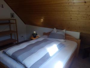 Postel nebo postele na pokoji v ubytování Landhaus Lautenthal