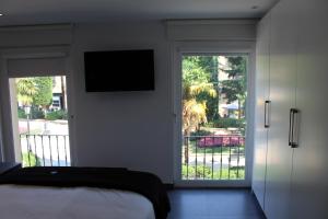 Cama o camas de una habitación en Salamanca Suites Libertad