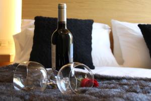 Cama o camas de una habitación en Salamanca Suites Libertad