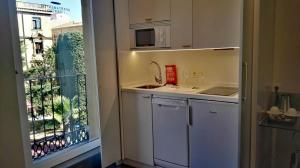 Una cocina o zona de cocina en Salamanca Suites Libertad
