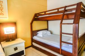 Postel nebo postele na pokoji v ubytování Bali Garden Beach Resort