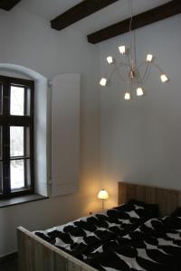 Postel nebo postele na pokoji v ubytování Lekehalom Tiszameer