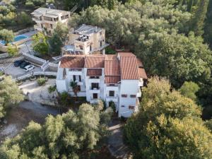 an aerial view of a house with trees at Corfu Room in Áyioi Dhéka