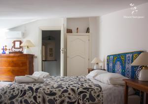 Posteľ alebo postele v izbe v ubytovaní Dimore Santojanni - La Casa sul Porto