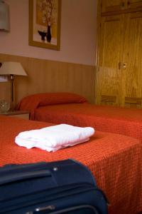Postel nebo postele na pokoji v ubytování Hotel Las Terrazas