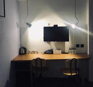 Kuchyň nebo kuchyňský kout v ubytování Just Inn Xin Yi 正旅館 信義
