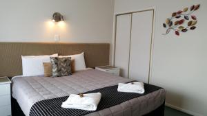 Postel nebo postele na pokoji v ubytování Aalton Motel