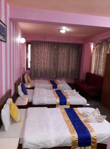 Кровать или кровати в номере Stupa Guest House 