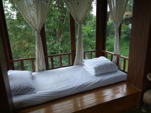 Khunyuam Resort 객실 침대