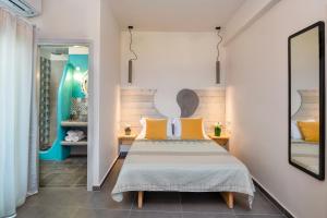 Voodi või voodid majutusasutuse Afrodete Hotel toas