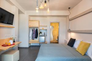 Voodi või voodid majutusasutuse Afrodete Hotel toas