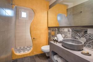Vannituba majutusasutuses Afrodete Hotel