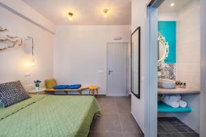 Voodi või voodid majutusasutuse Afrodete Hotel toas