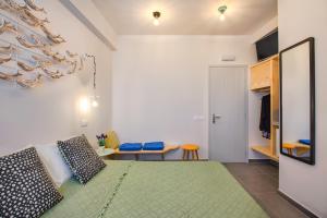 Voodi või voodid majutusasutuse Afrodete Hotel toas
