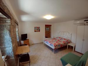 Posteľ alebo postele v izbe v ubytovaní Guesthouse Totićevi