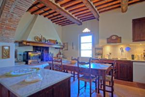 A kitchen or kitchenette at Villa Camaiore by PosarelliVillas