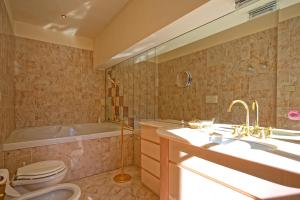 A bathroom at Villa Camaiore by PosarelliVillas