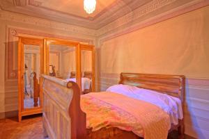 A bed or beds in a room at Villa Camaiore by PosarelliVillas