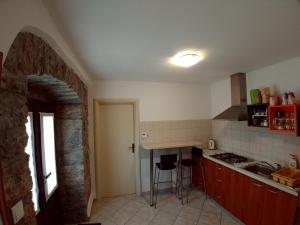 Kuchyňa alebo kuchynka v ubytovaní Guesthouse Totićevi