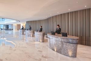 Mitarbeiter der Unterkunft Harbour Grand Kowloon