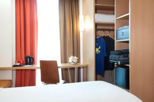 Voodi või voodid majutusasutuse Ibis Bandung Trans Studio toas